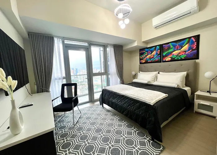 Cozy 2 Bedrooms In Bgc With Balcony Bathtub 600mbps Апартаменты *