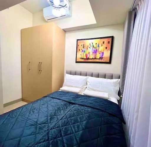 Апартаменты Cozy 2 Bedrooms In Bgc With Balcony Bathtub 600mbps
