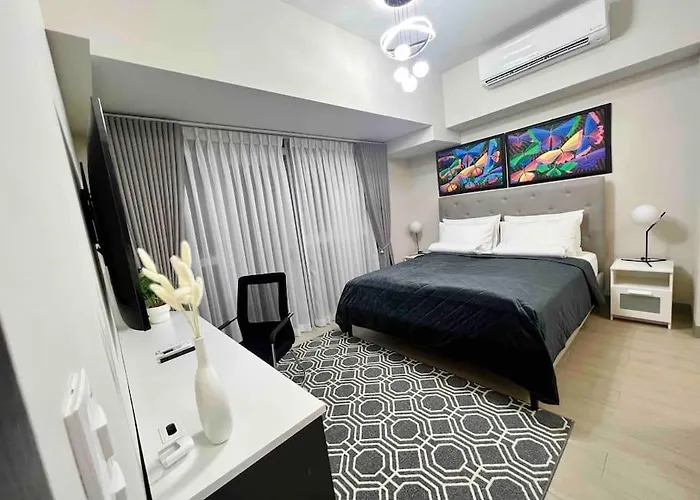 Апартаменты Cozy 2 Bedrooms In Bgc With Balcony Bathtub 600mbps